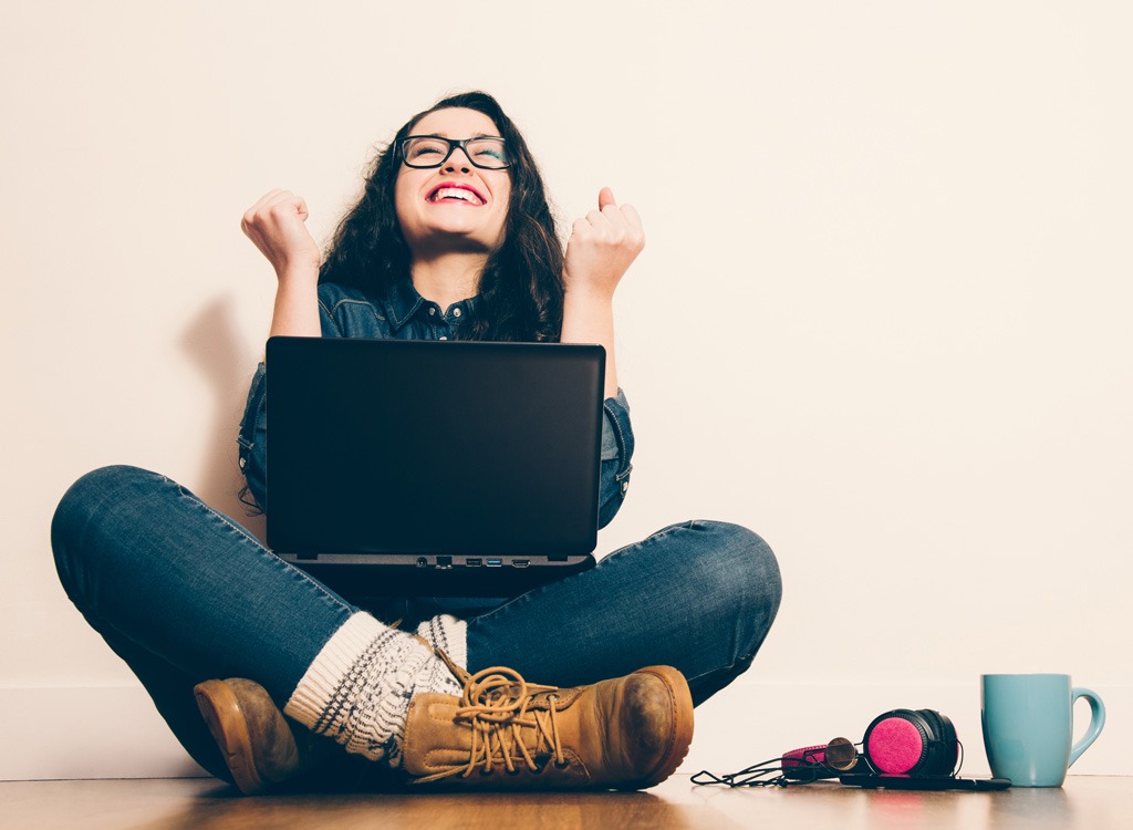 Woman successful winning on computer