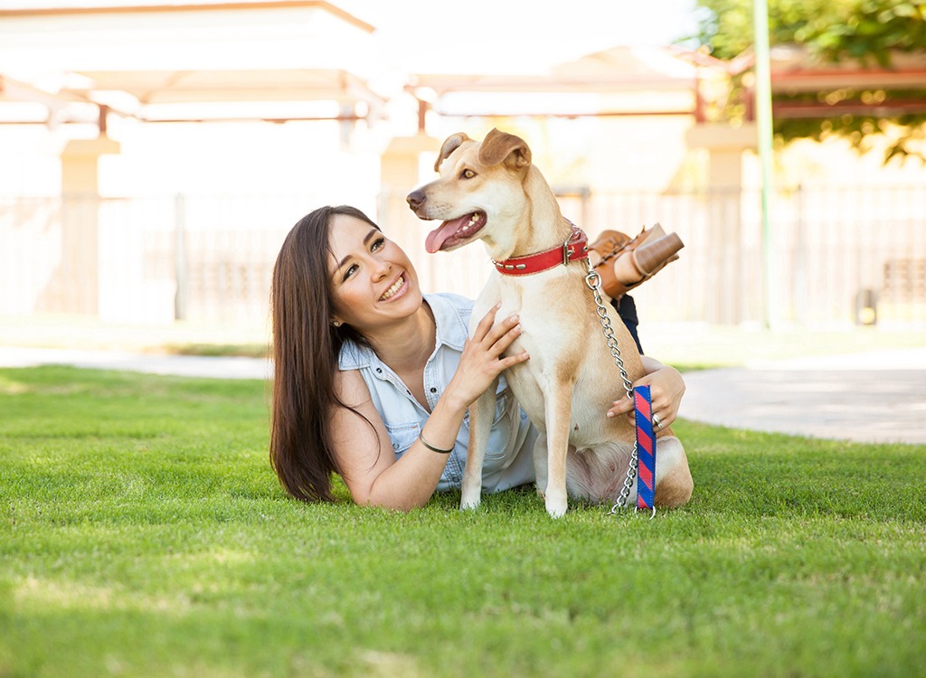 Woman smiling at dog